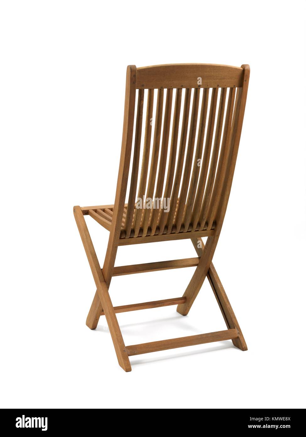 A deck chair isolated against a white background Stock Photo - Alamy