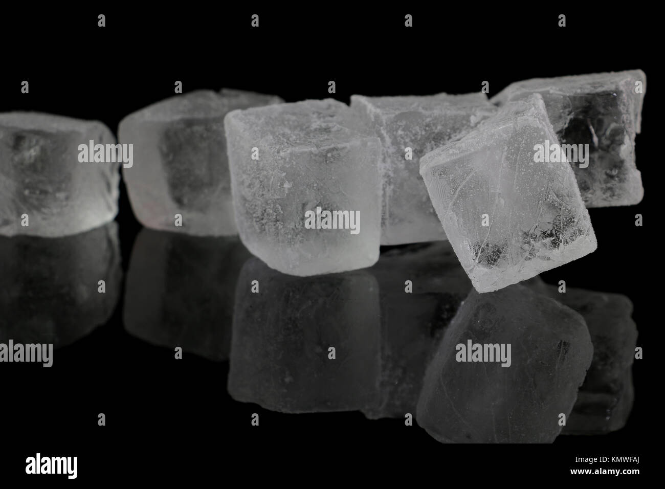 ice cube isolated on black background Stock Photo - Alamy