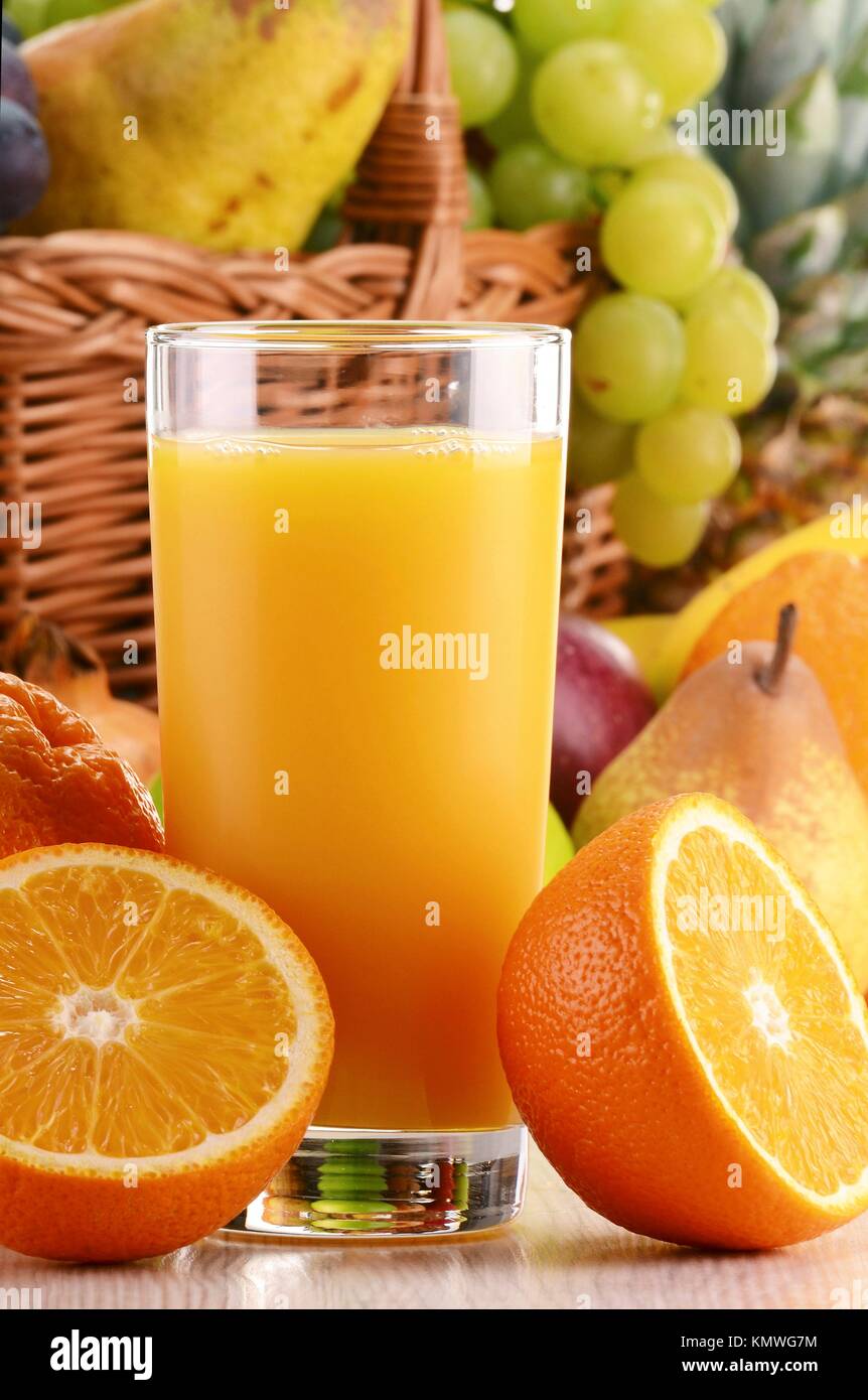 Glasses of orange juice and fruits Stock Photo Alamy