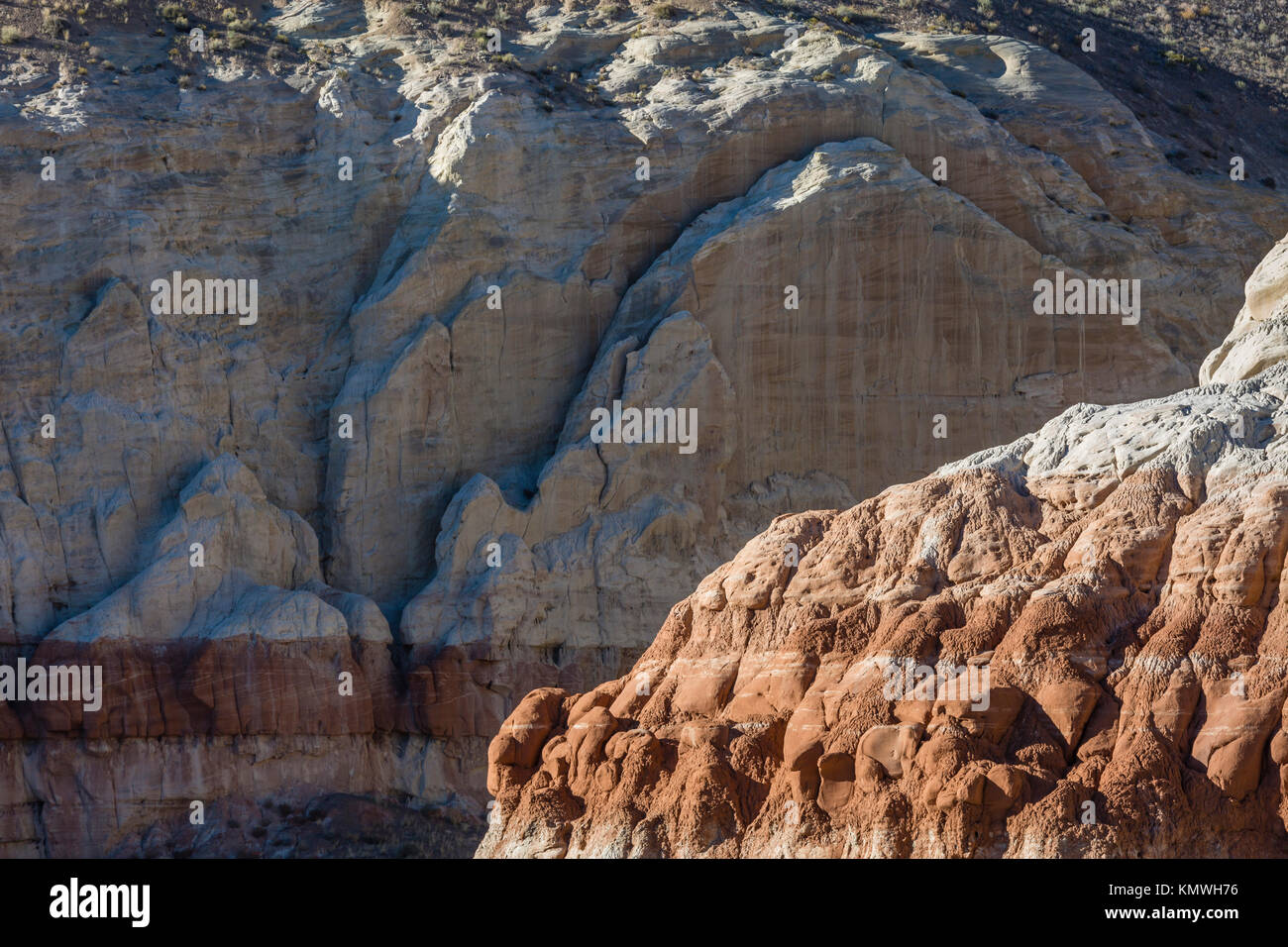 Eroding layers of white and chocolate cliff layers in Grand Staircase-Escalante National Monument near Kanab, Utah Stock Photo