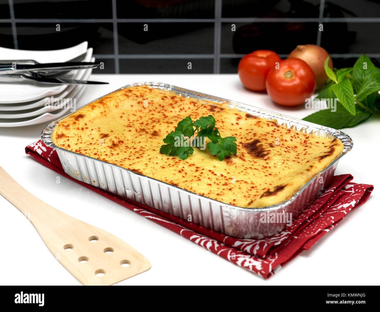 A tray of lasagne ready for plating Stock Photo Alamy