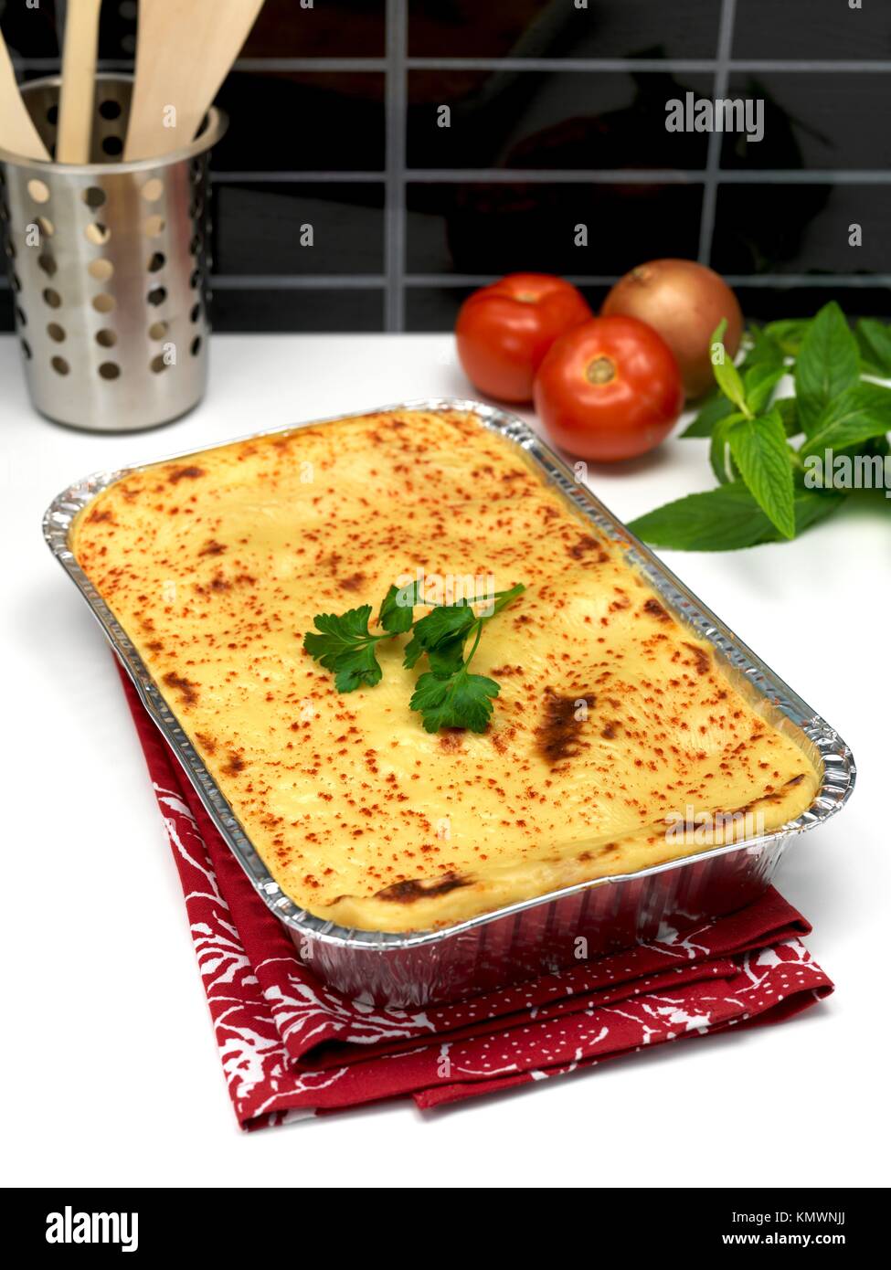 A tray of lasagne ready for plating Stock Photo Alamy