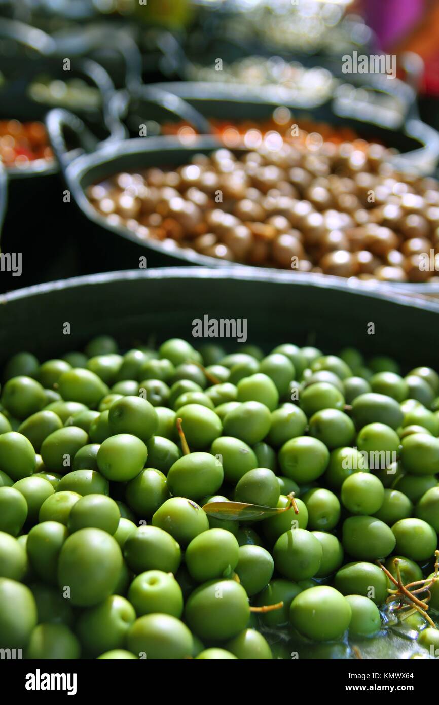 olives in pickling brine pattern background texture in market Stock