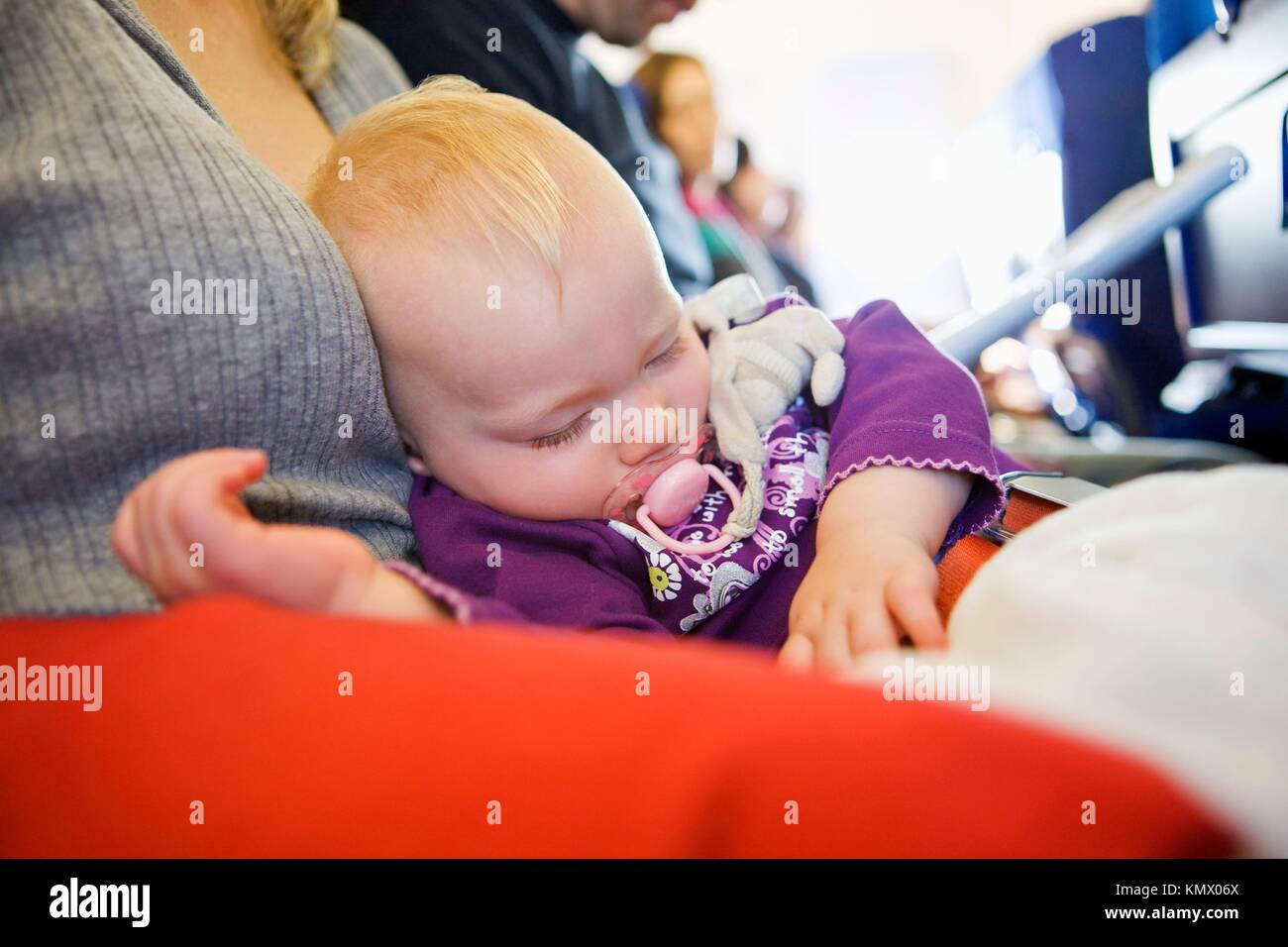 toddler girl sleeping on plane Stock Photo Alamy