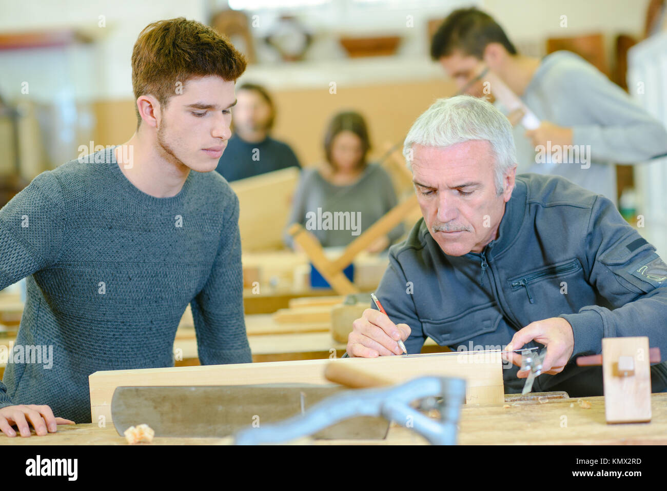 group of students in woodwork training course Stock Photo - Alamy