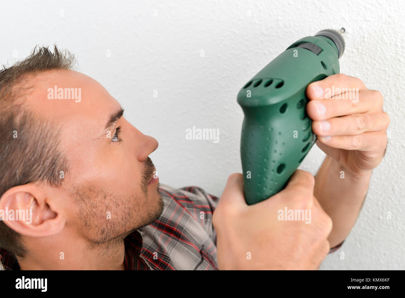 Using a cordless power drill Stock Photo