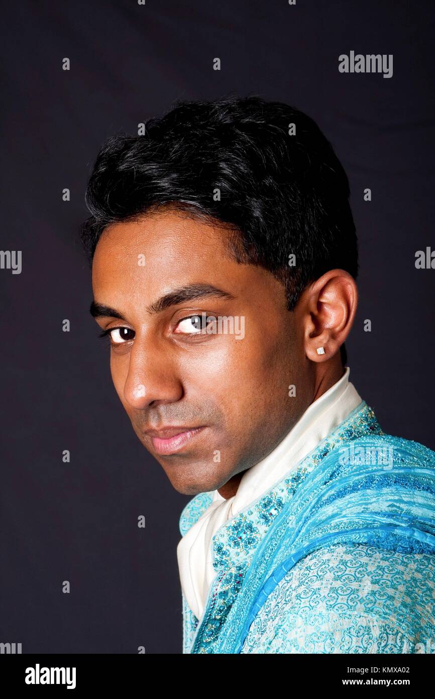 Beautiful Face Of An Indian Hindu Young Man With Earring Wearing Blue Dhoti Portrait Of Handsome Beautiful Face Of An Indian Hindu Young Man With Earring Wearing Blue Dhoti Portrait Of Handsome