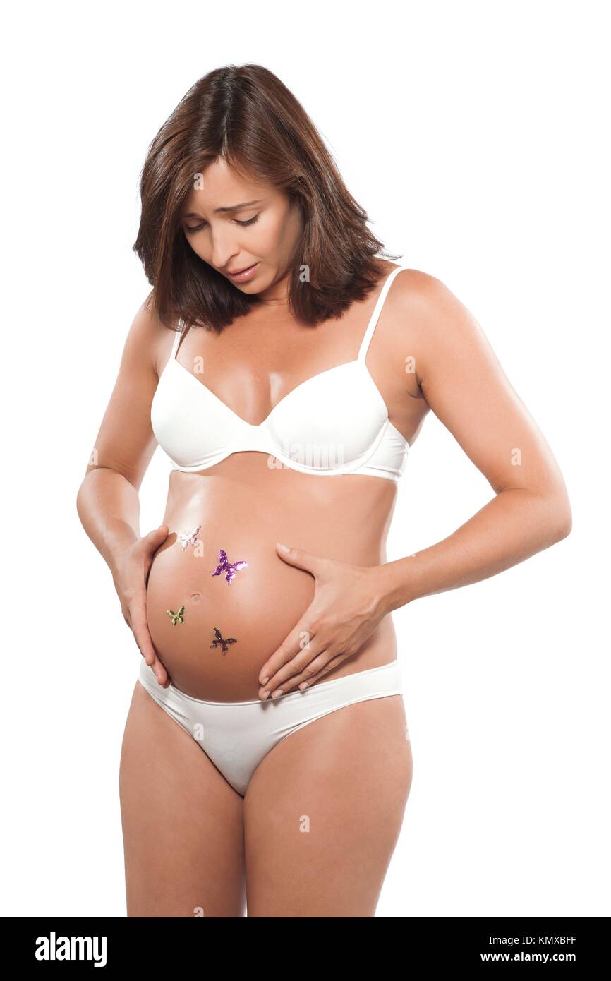 caucasian pregnant woman stress anxious with butterfly in the stomach