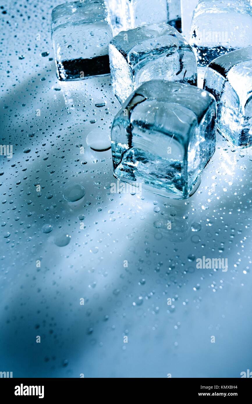 https://c8.alamy.com/comp/KMXBH4/abstract-backgrounds-with-ice-cubes-over-wet-glass-KMXBH4.jpg