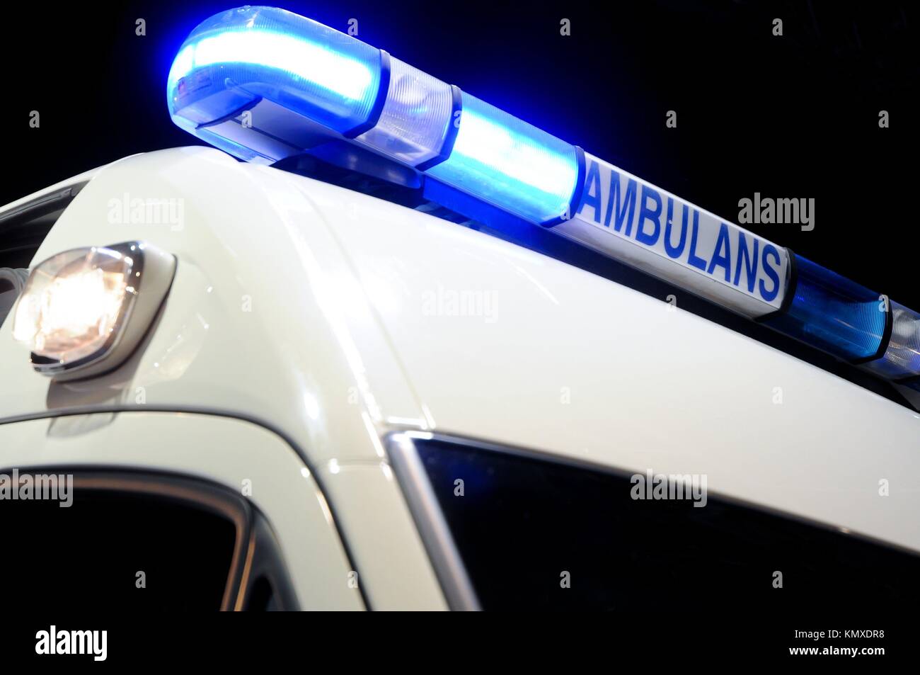 blue ambulance emergency light, isolated on black Stock Photo Alamy