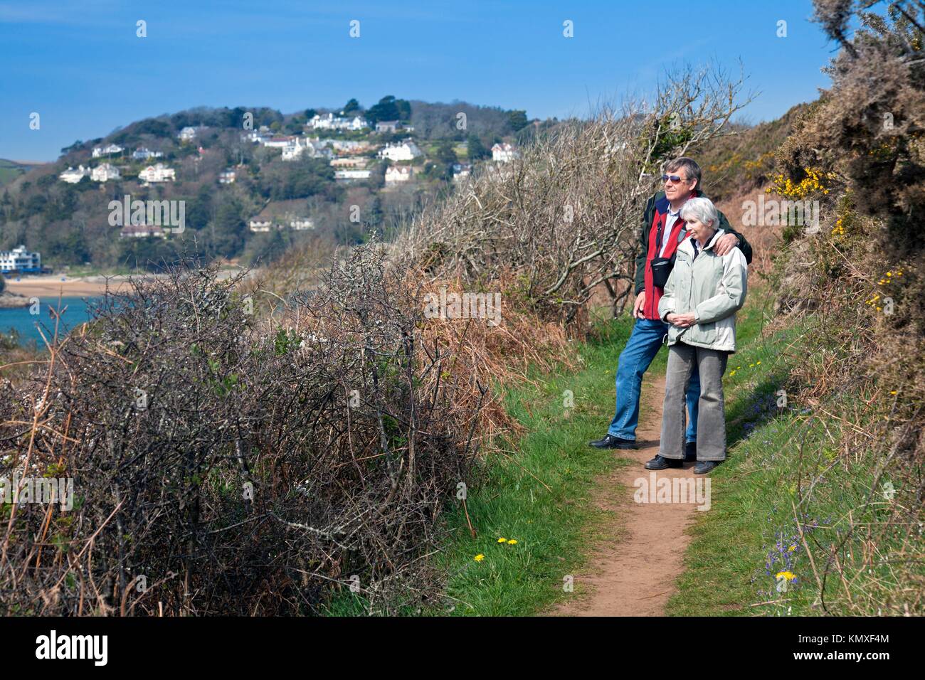 England Devon East Portlemouth Couple walking coast path at Limebury Point Stock Photo