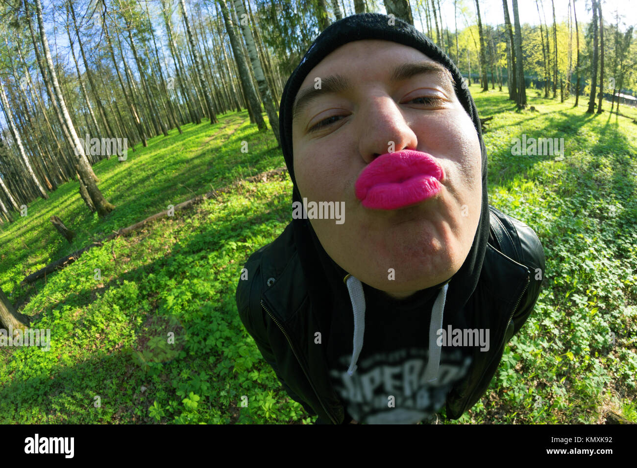 funny young men with pink lips. fisheye lens Stock Photo Alamy