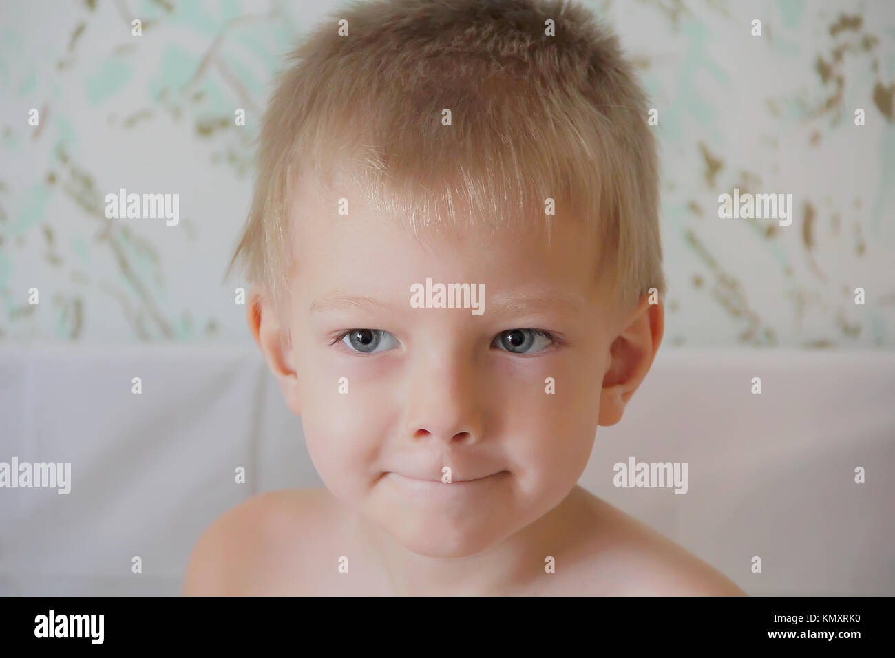 Portrait of cute boy with blue eyes Stock Photo Alamy