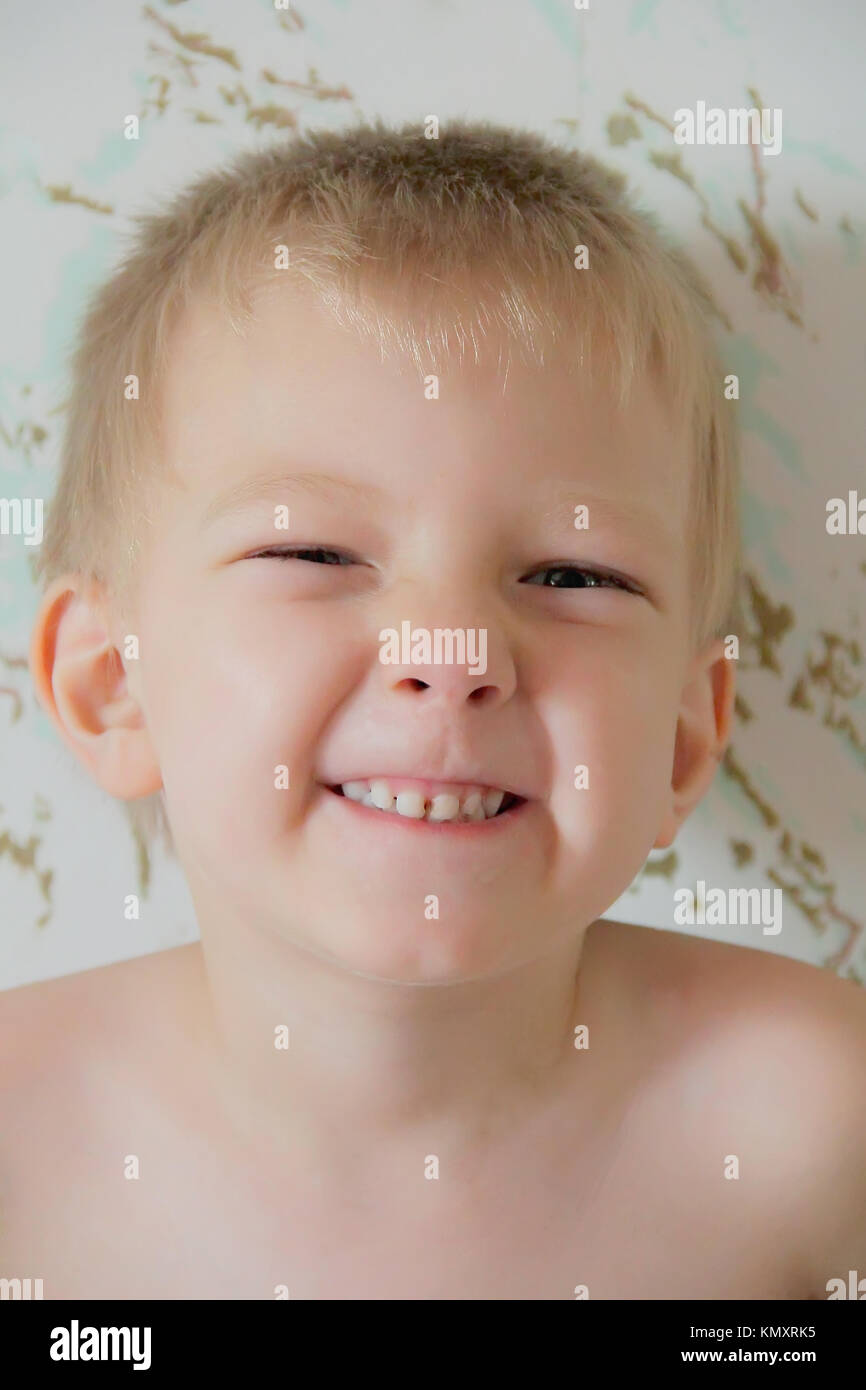 Portrait of cute boy with blue eyes Stock Photo Alamy