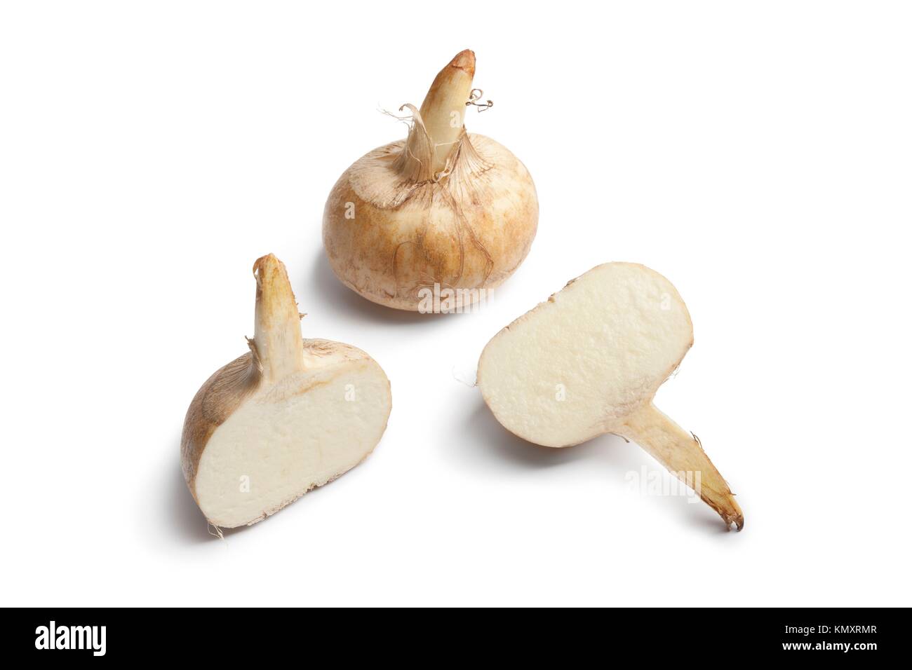 Whole and half Jicama roots isolated on white background Stock Photo