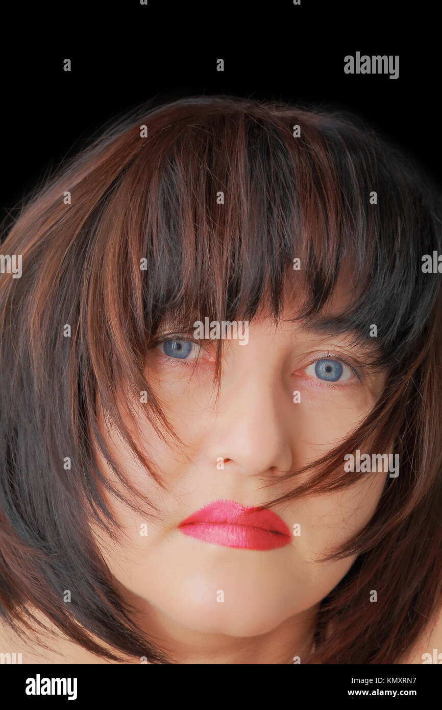 Portrait of woman with blue eyes and black hair Stock Photo - Alamy