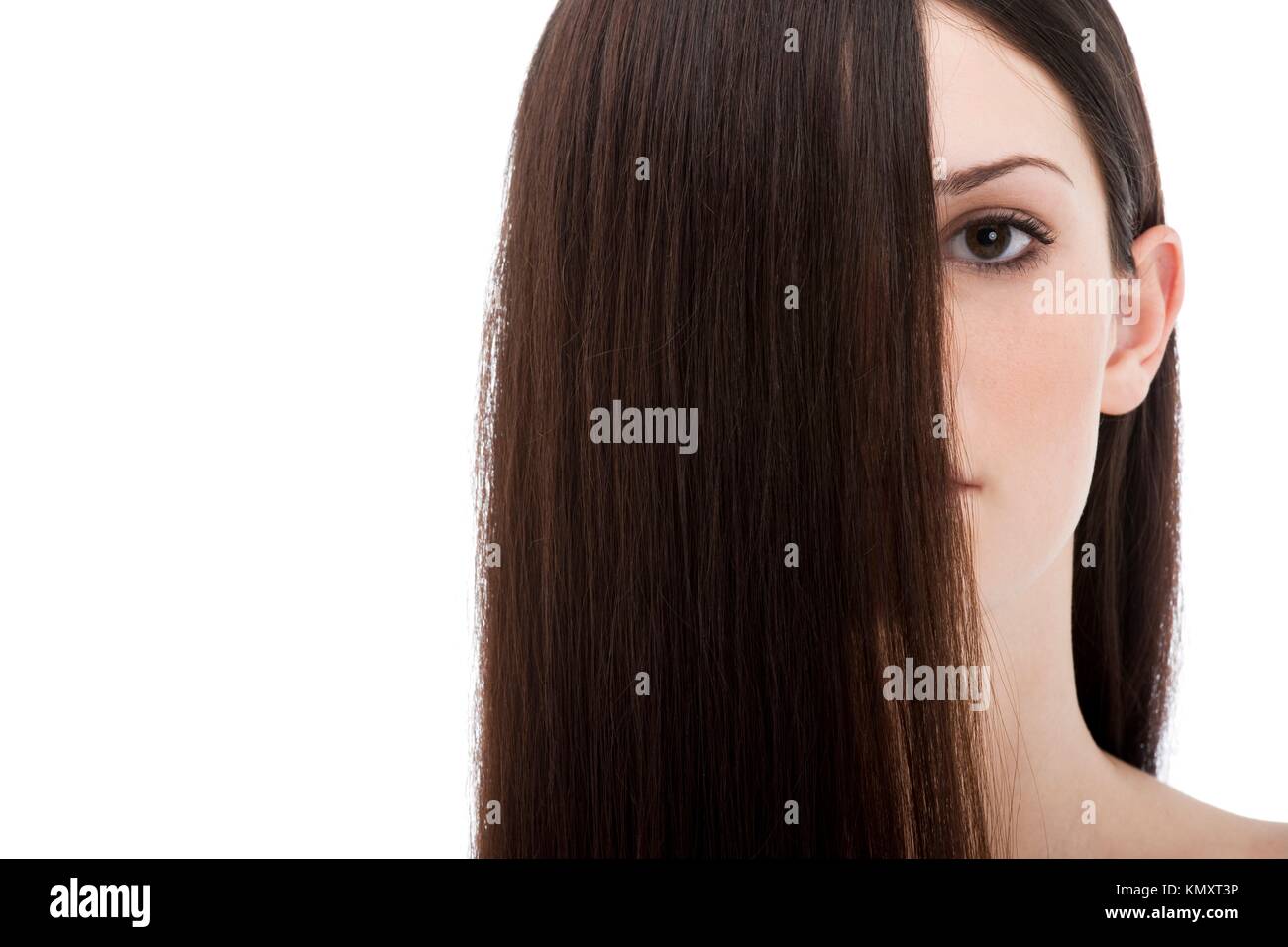 Long beautiful hair covering half face Stock Photo