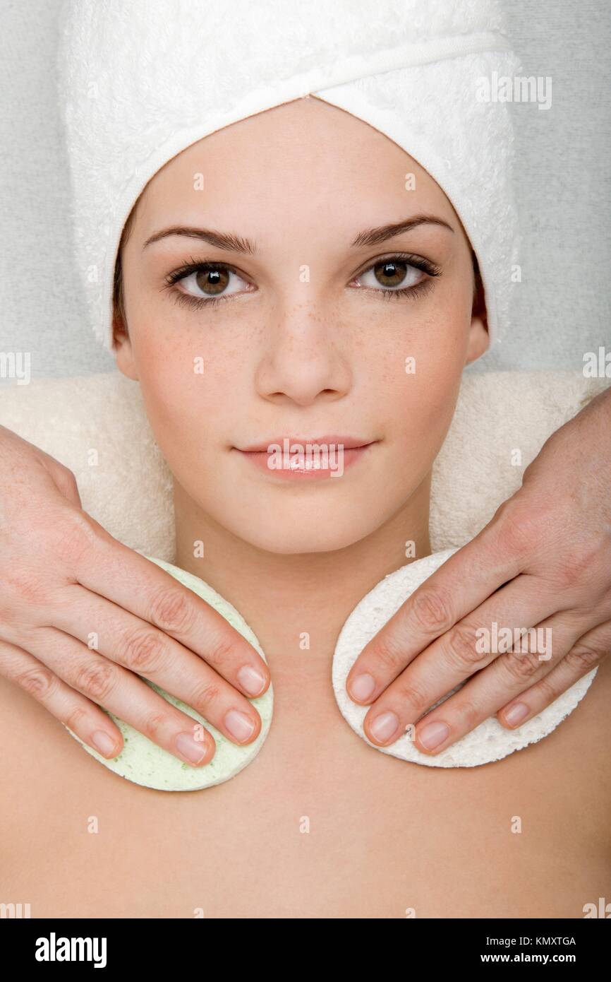 Young woman receiving face cleansing at beauty spa Stock Photo Alamy