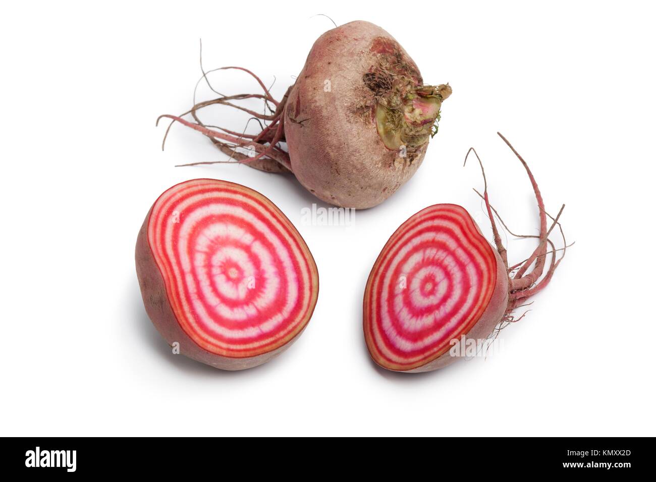 Whole and partial chioggia beets on white background Stock Photo
