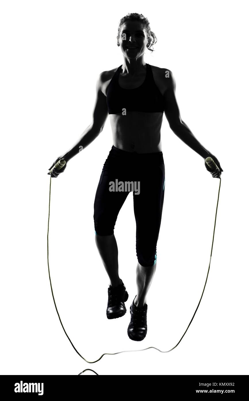 woman workout fitness posture body building jumping rope exercise  exercising on studio isolated white background Stock Photo - Alamy