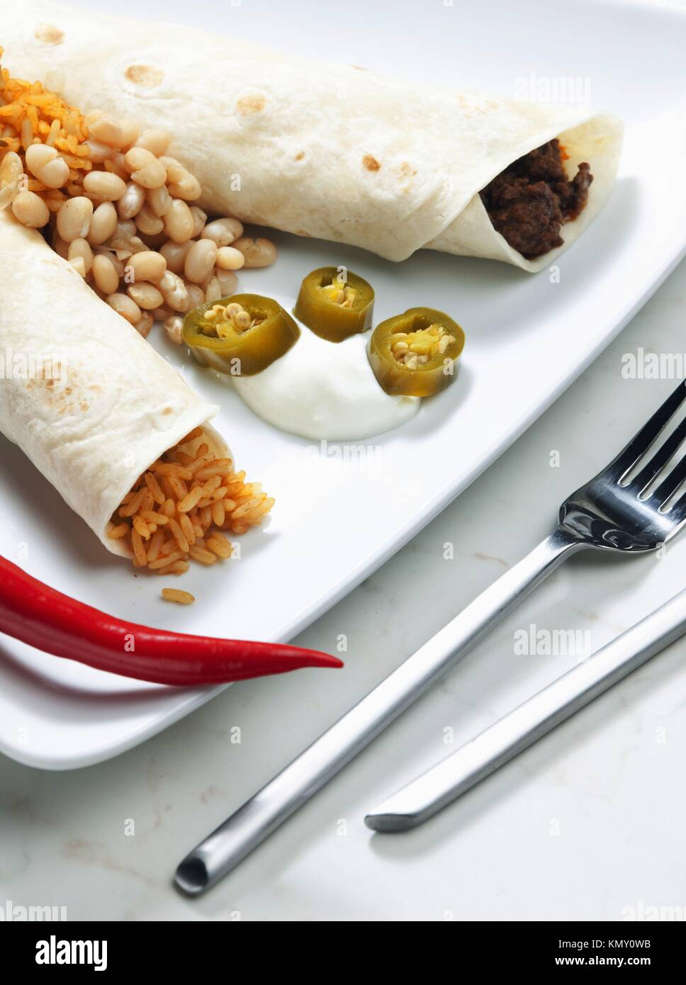 beef burritos with beans and rice Stock Photo - Alamy