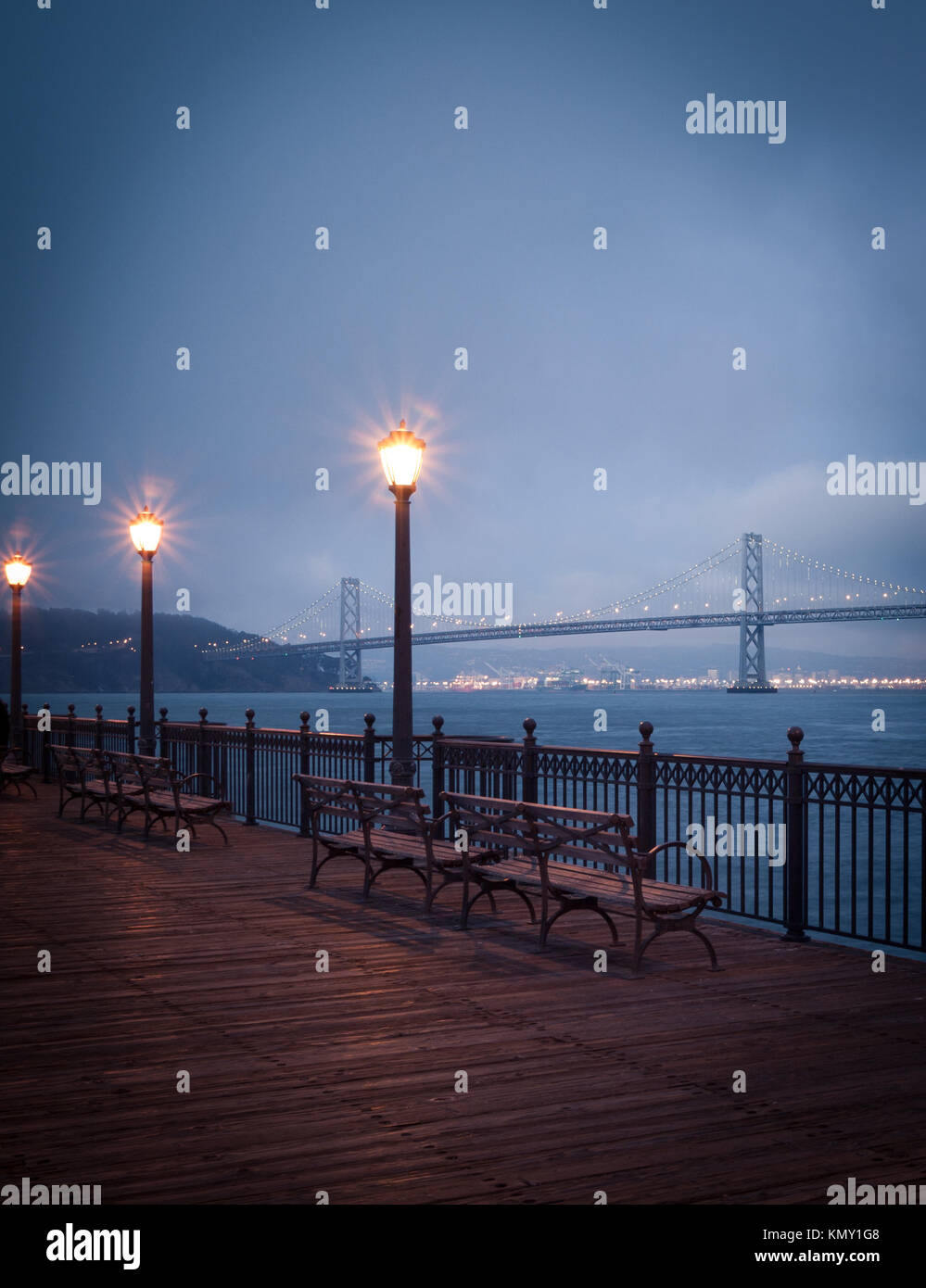 A view of Pier 7 and the Bay Bridge in San Francisco, California. Stock Photo
