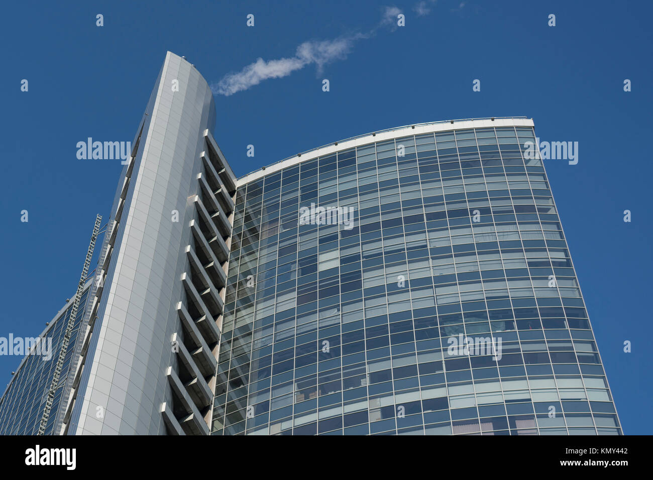 Glass office building on blue sky background Stock Photo - Alamy