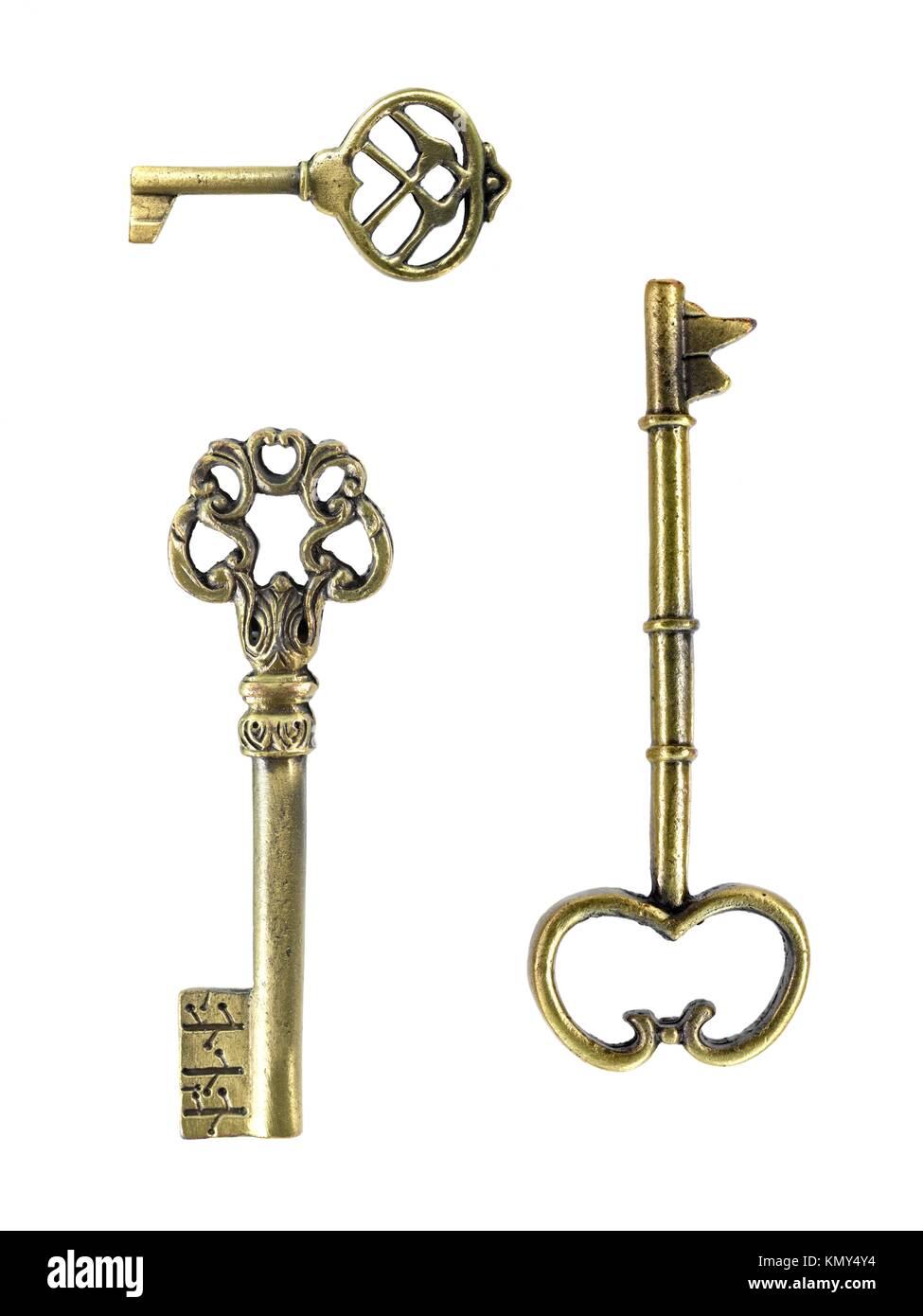 Vintage brass keys isolated against a white background Stock Photo Alamy