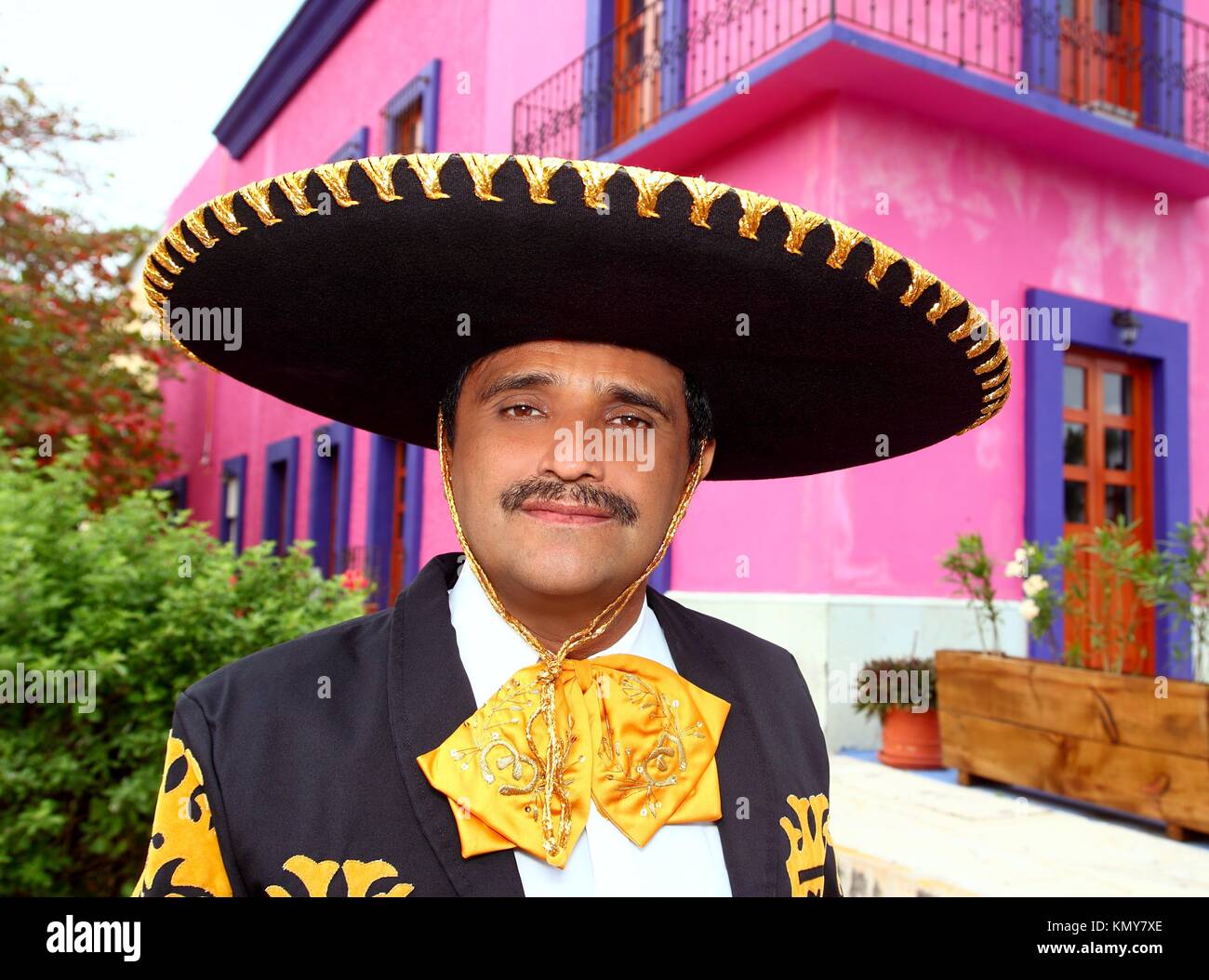 Charro mexican Mariachi portrait in pink Mexico house Stock Photo - Alamy