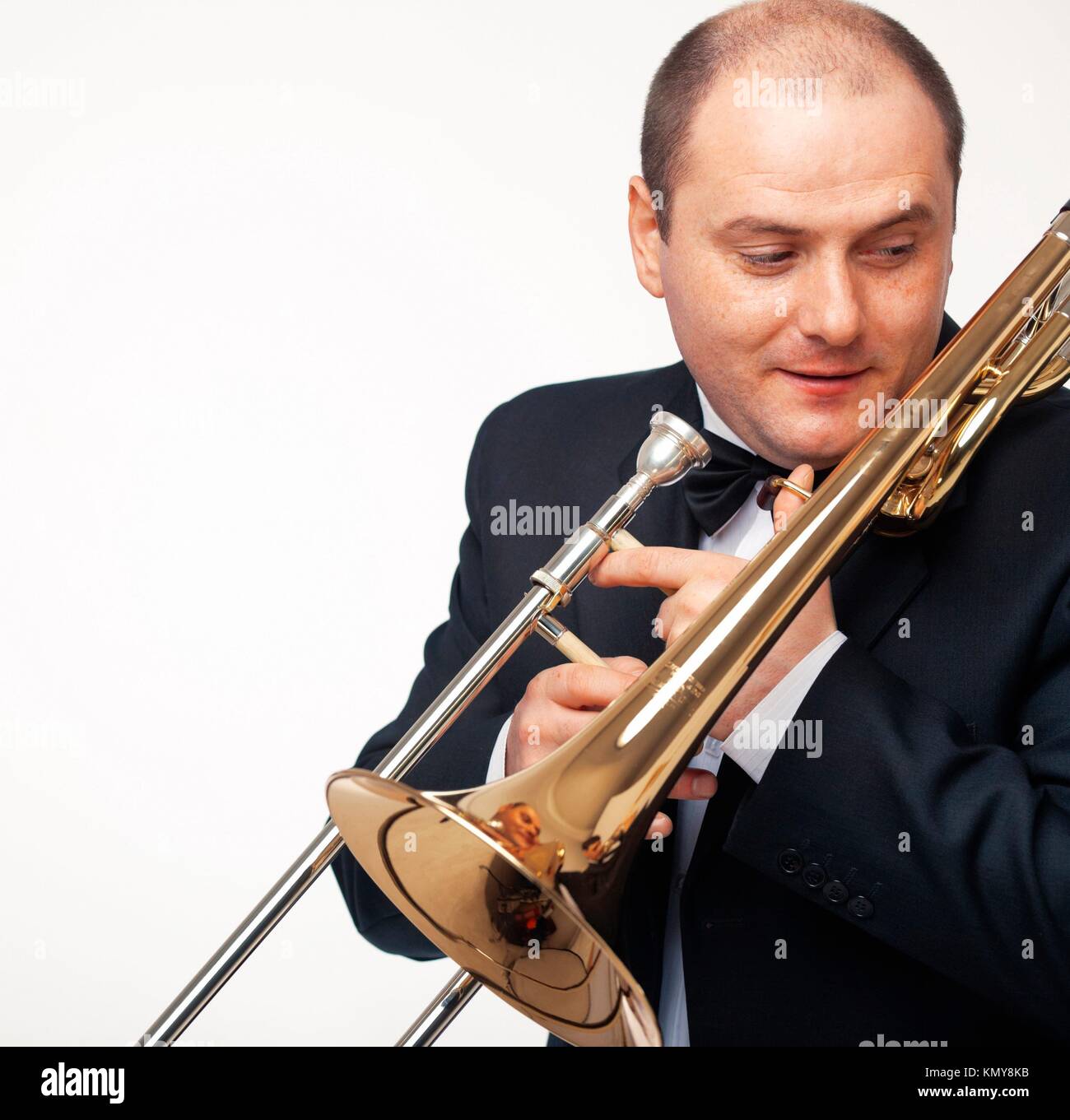 Young man with his trombone Stock Photo Alamy