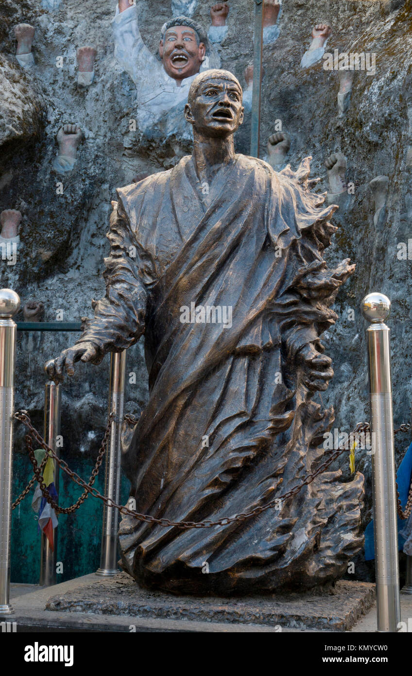 Bronze sculpture memorial at Dalai Lama temple to Tibetans who have died in self-immolations in protest of Chinese occupation in Tibet Stock Photo