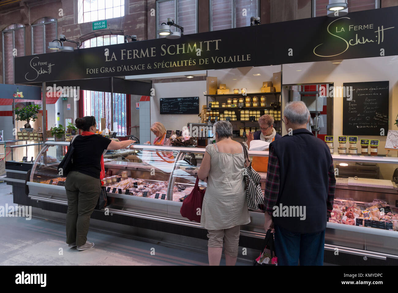 Foie gras and other local delicacies on sale at the covered market of Colmar Stock Photo