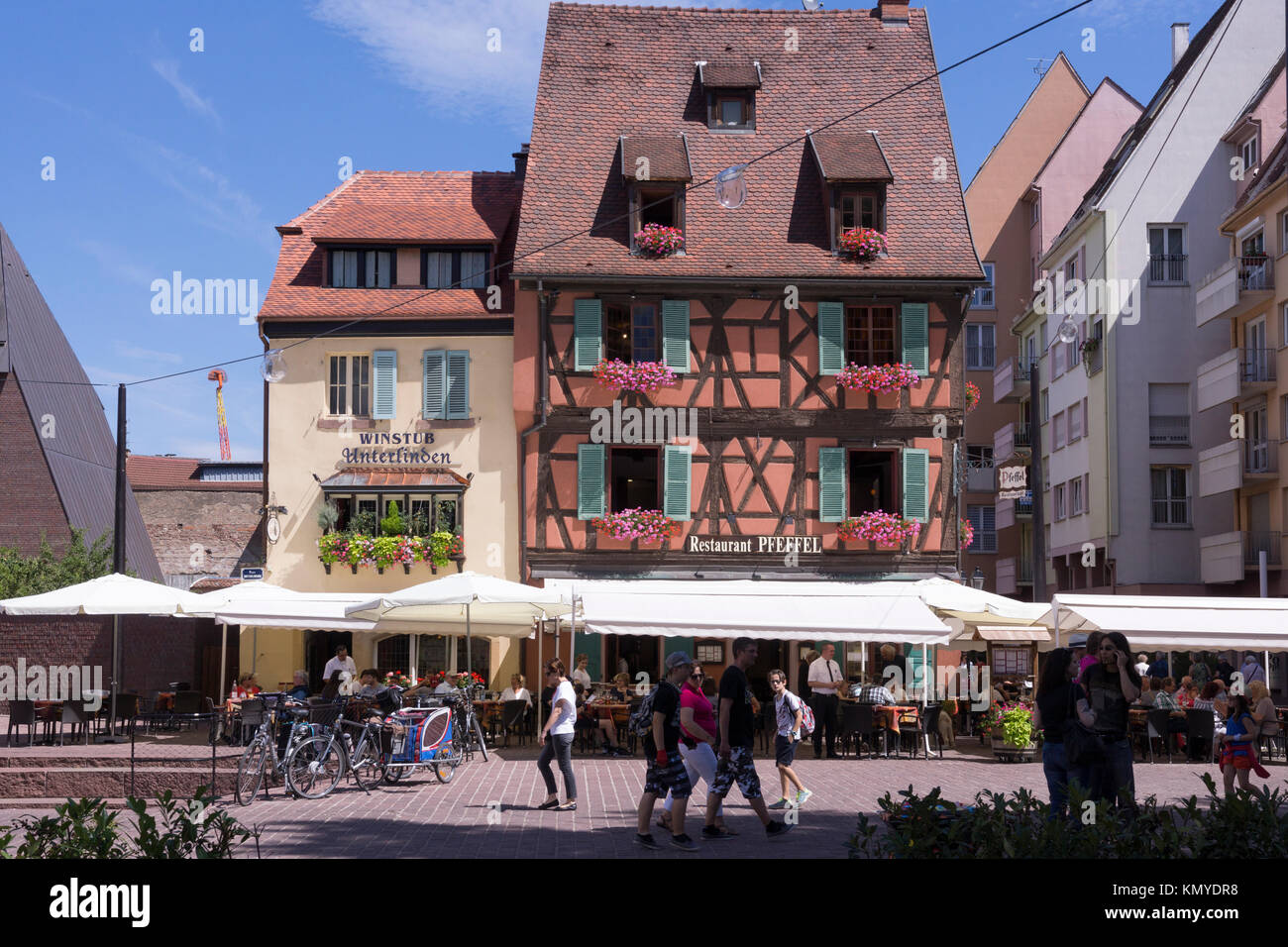 The Restaurant Pfeffel and Winstub Unterlinden, popular with tourists on a summer's day in Colmar, Alsace Stock Photo