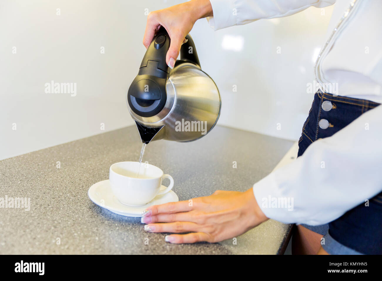 Pouring water into kettle hires stock photography and images Alamy