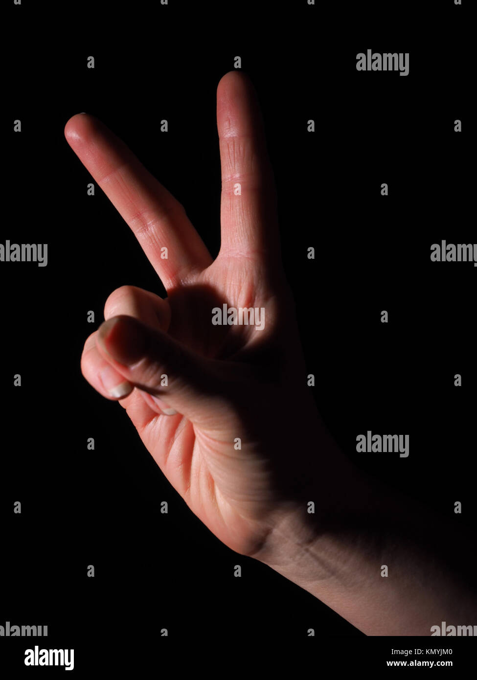 hand on a black background Stock Photo - Alamy