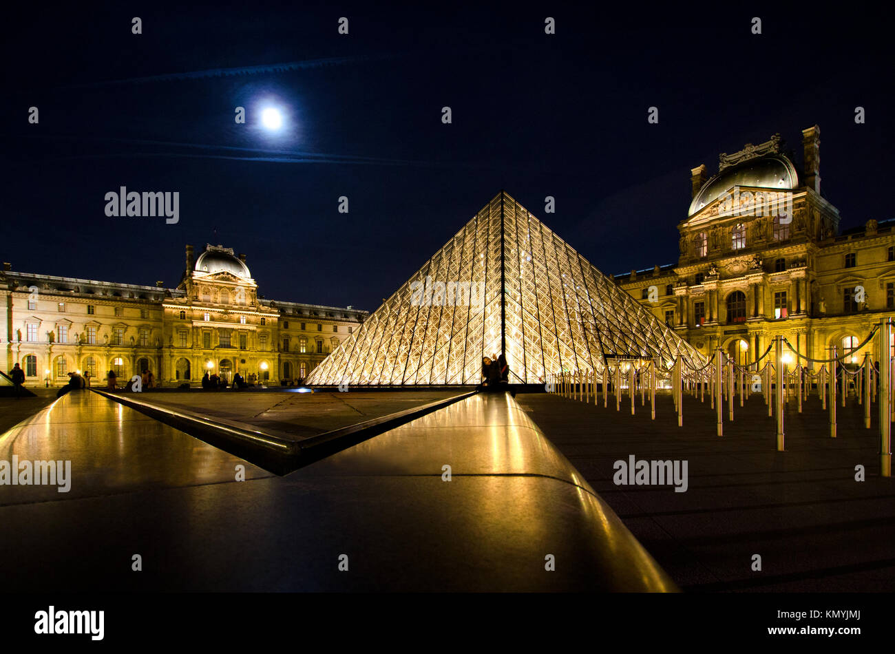 Paris, France. Palais du Louvre and I M Pei's Pyramide du Louvre / Louvre Pyramid (1989) at night. Stock Photo