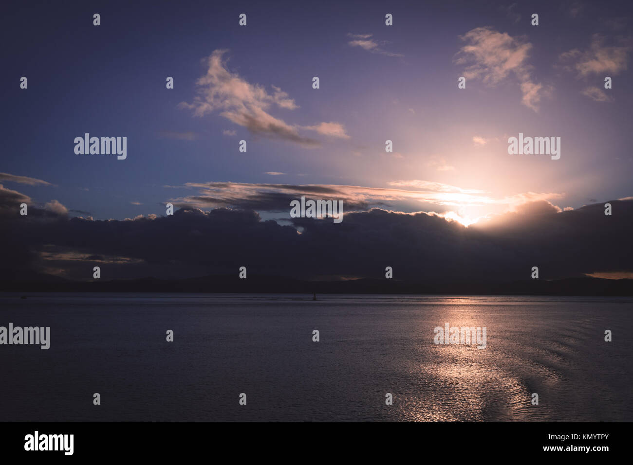 Sunrise over the sea looking out from the Isle of Mull Stock Photo - Alamy