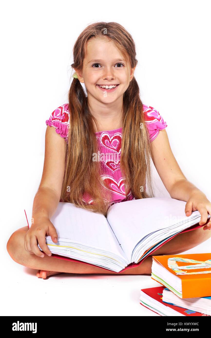 Eight year old girl reading hires stock photography and images Alamy