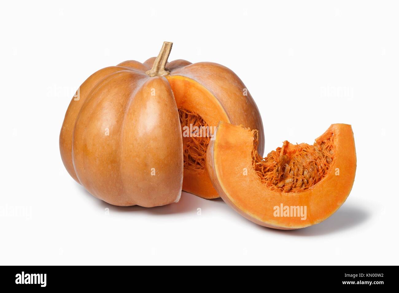 Muscat de Provence pumpkin with a slice on white background Stock Photo
