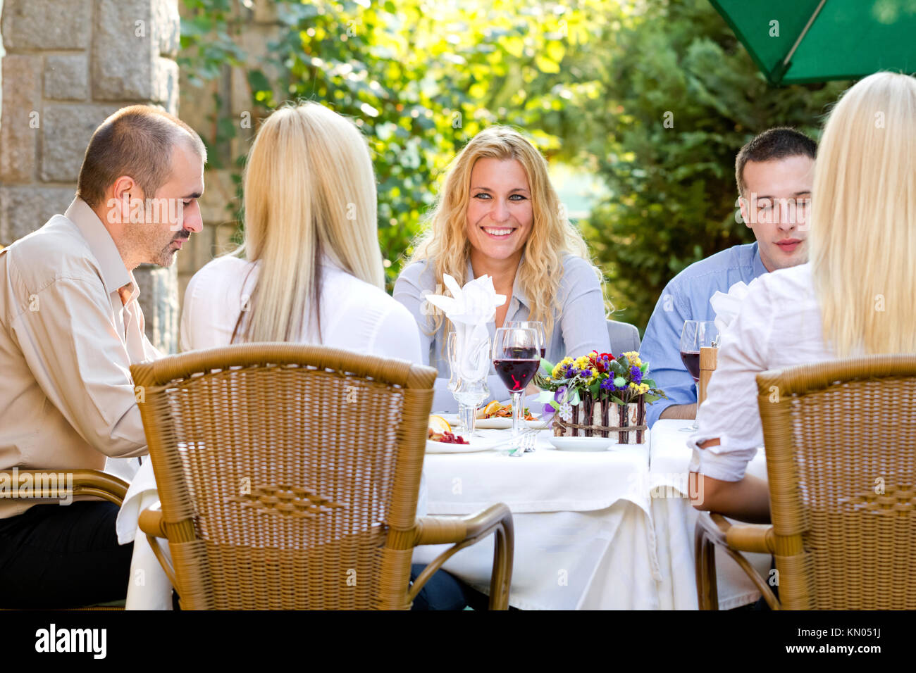 young business people at the lunch restaurant discussing Stock Photo