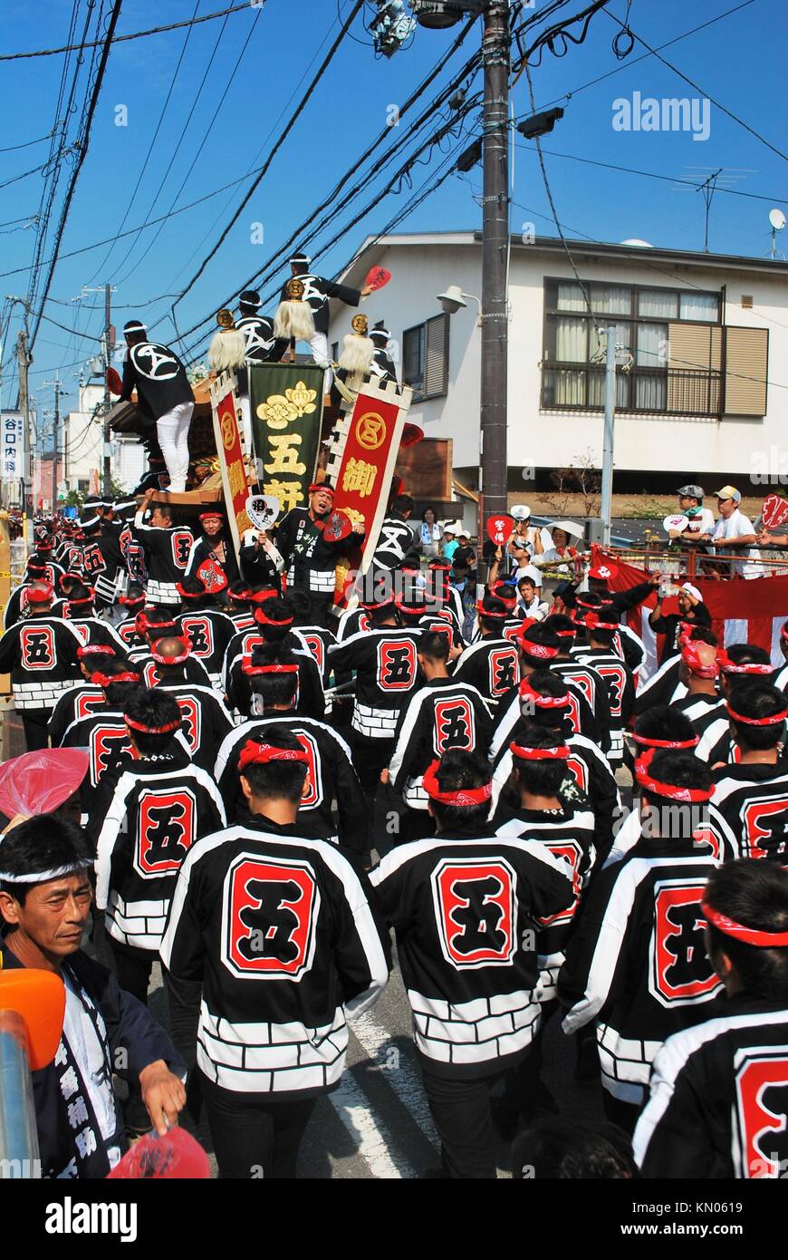 JAPAN - SEP 13: Annual Danjiri festival held on Sept 13, 2008 in Kishiwada ward, Osaka, Japan. In this event, huge wooden floats are carried by a team Stock Photo