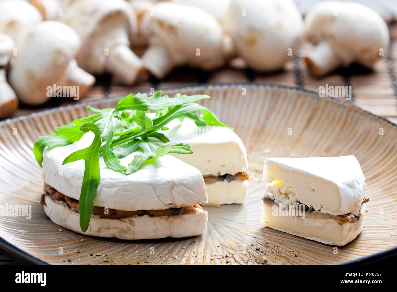 cheese brie filled with roasted mushrooms Stock Photo Alamy