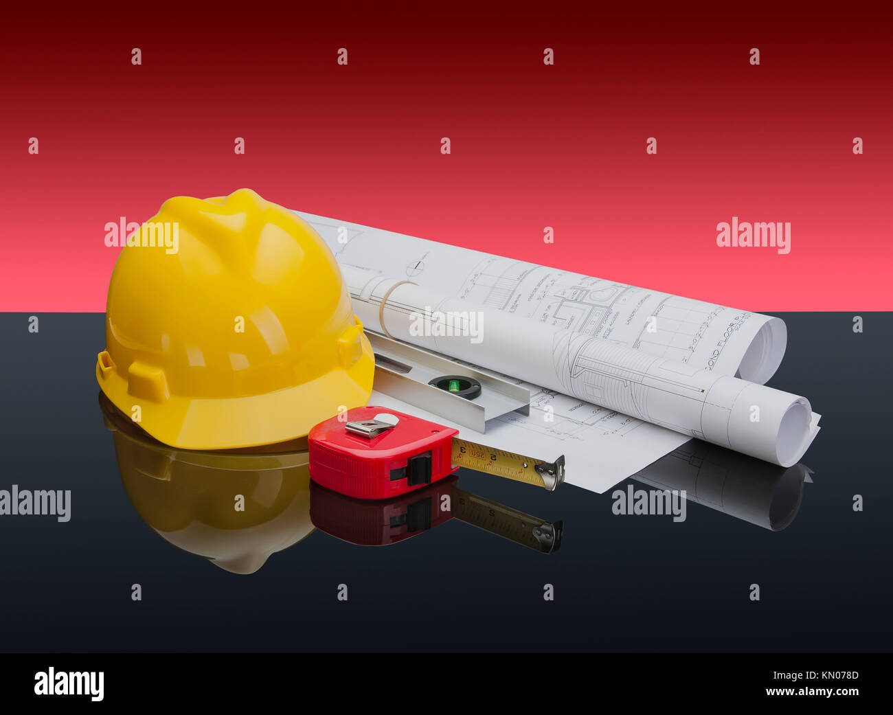 Construction site safety gear and tools with blueprints Stock Photo Alamy
