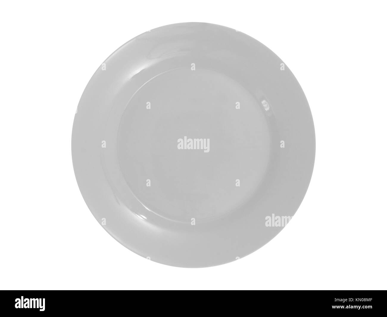 A dinner setting with cutlery and plates Stock Photo Alamy