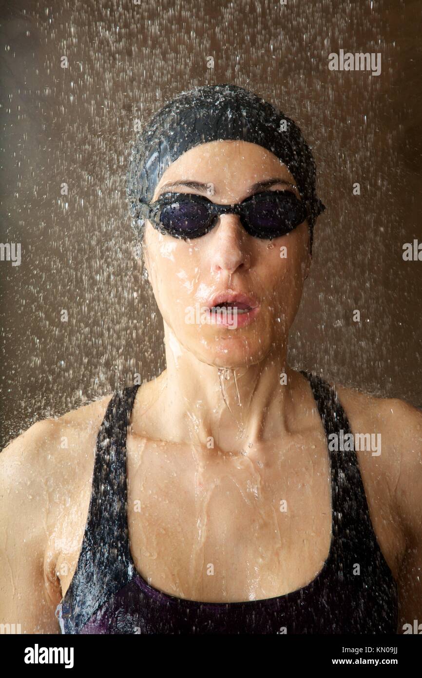 woman taking a shower under water jet Stock Photo Alamy