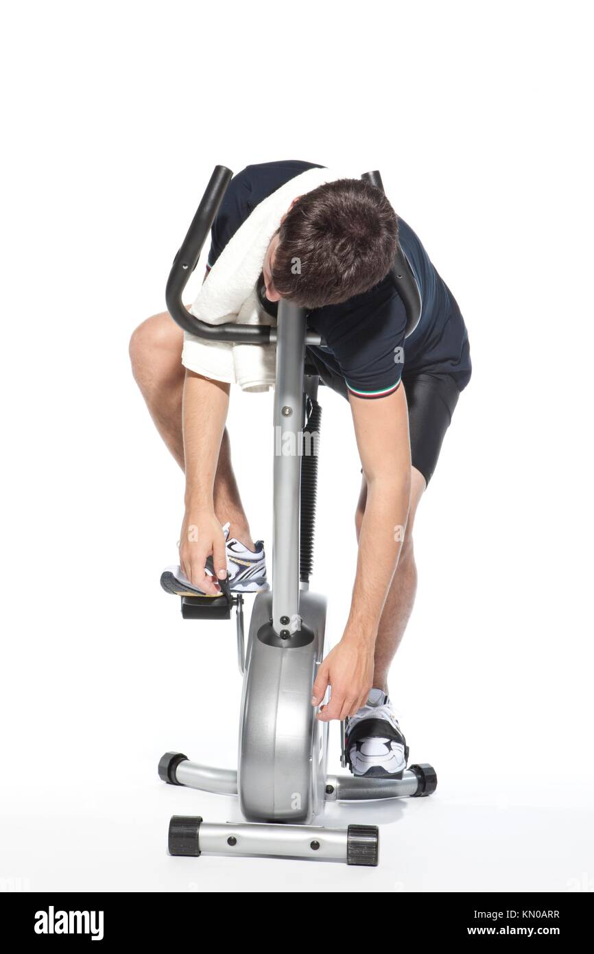 man who pedal stationary bikes, cyclette Stock Photo Alamy
