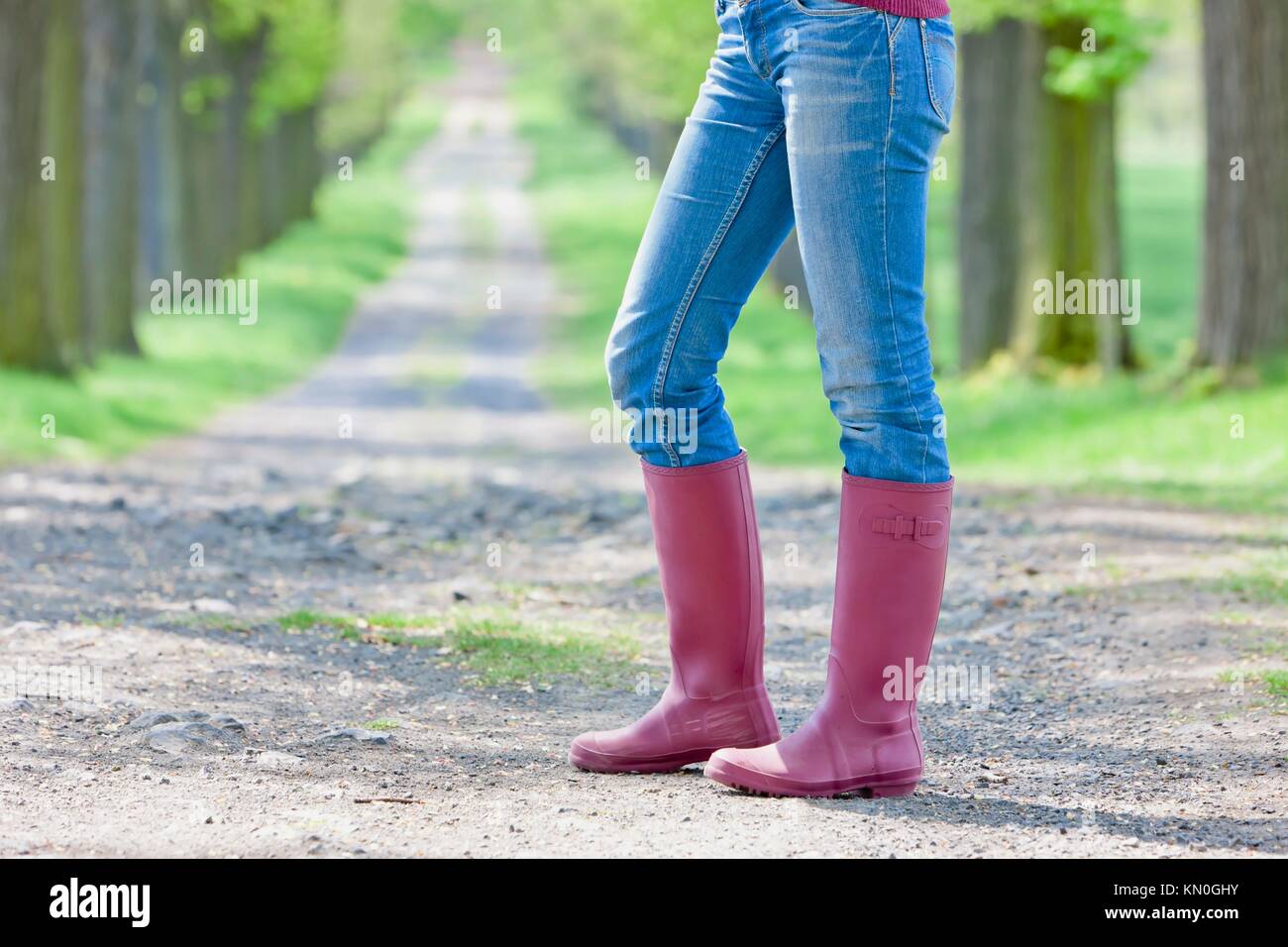 detail of woman wearing rubber boots Stock Photo - Alamy