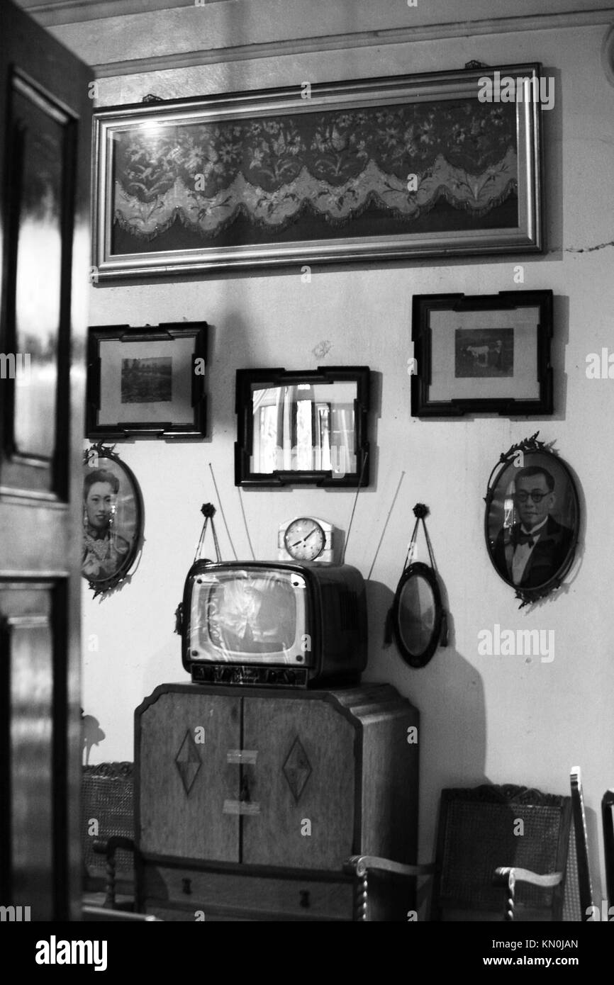 a view of framed art hanging on a wall in Penang Malaysia Stock Photo Alamy