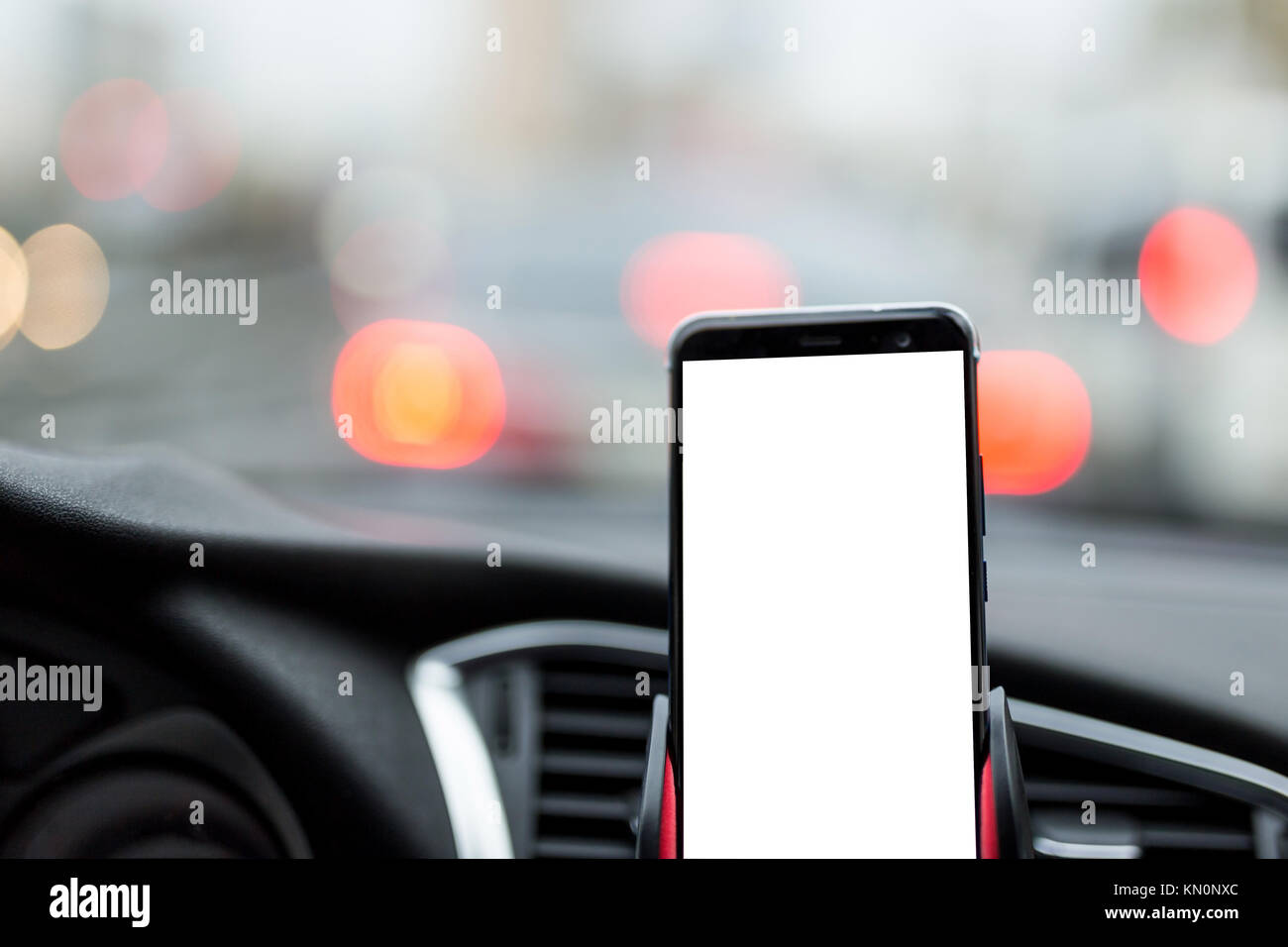 Download Smartphone Or Gps Device In A Holder On Car S Dashboard With Blurred Stock Photo Alamy PSD Mockup Templates
