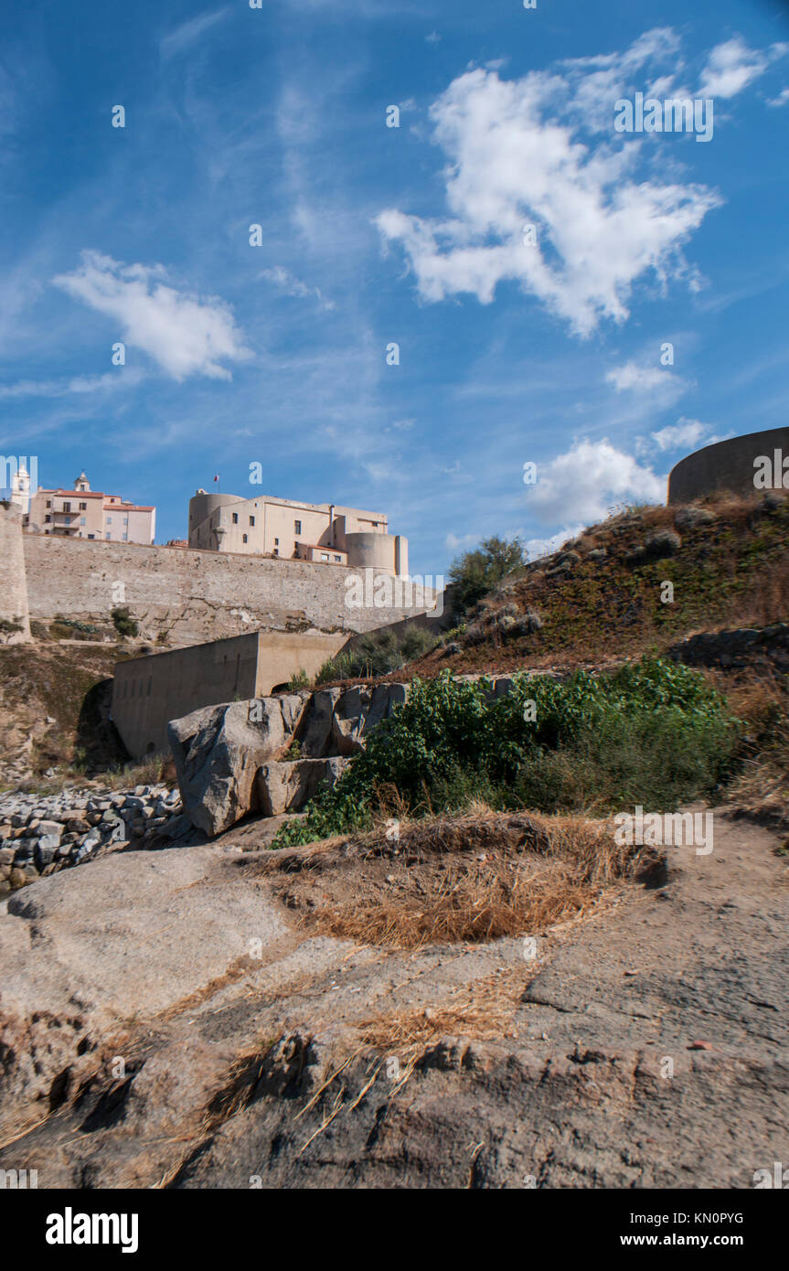 Corsica: skyline of the Citadel of Calvi, famous touristic destination on the northwest coast, with its ancient walls and bell towers of the churches Stock Photo